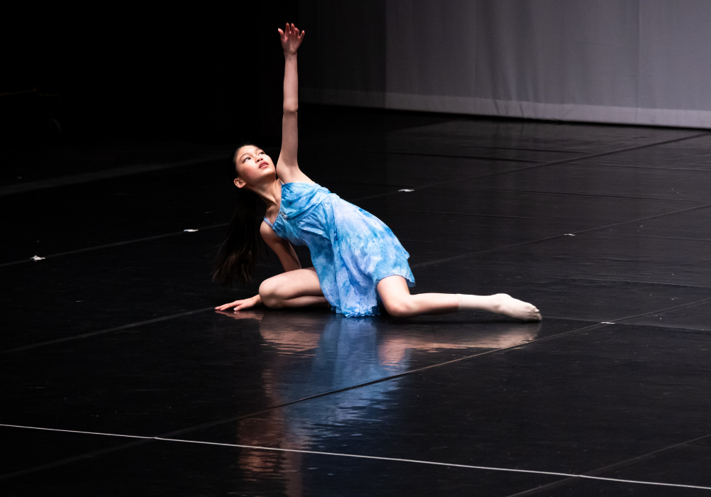 Neo-classical dancer in blue dress performing on stage in Roodepoort Theatre